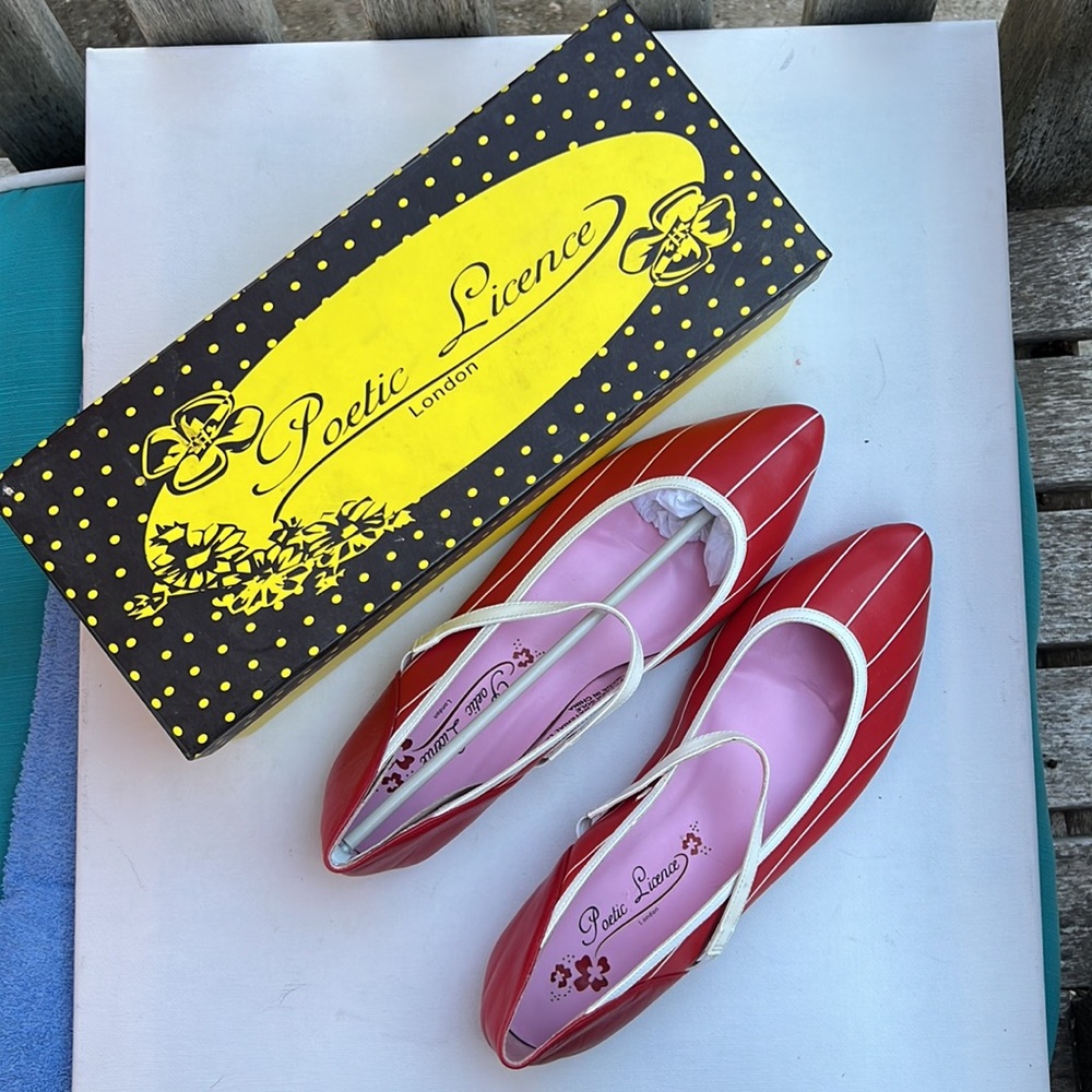Bright, fun and cute Poetic Licence Red with white stripes flat shoes. 8-1/2.